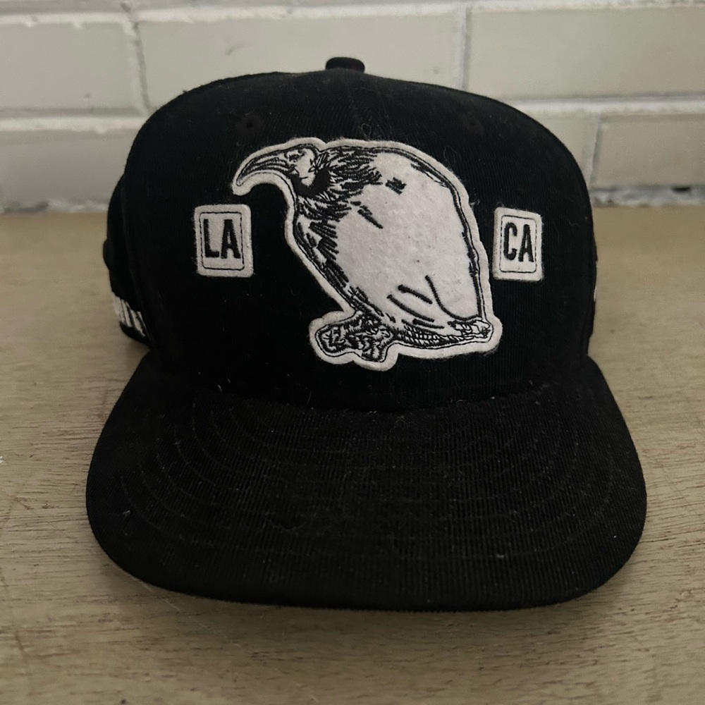 Primitive New Era Black Cap with Bird Patch